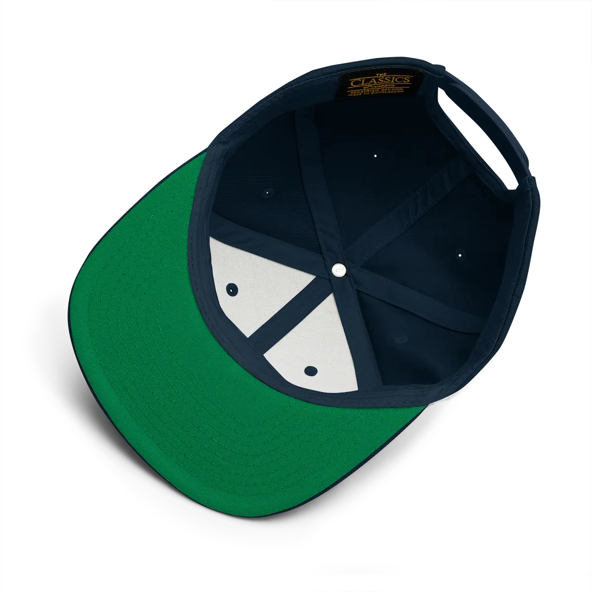 Shin snapback cap in dark navy, green under-visor and interior