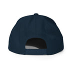 Unwritten snapback cap in navy, back view with snapback closure