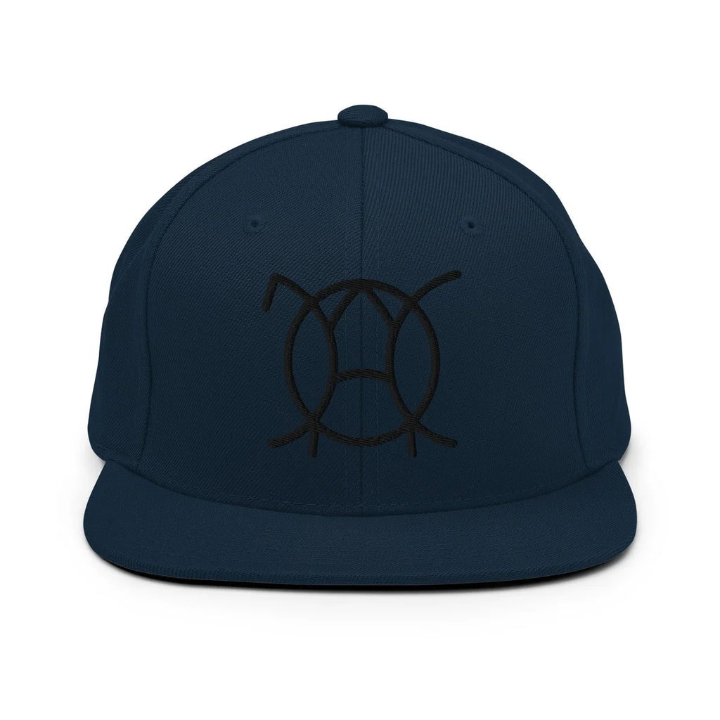 Unwritten snapback cap in navy, front view with embroidered JaOcCo symbol