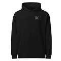 Unwritten oversized hoodie in black, front view with small JaOcCo logo