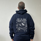 Nature Is Calling hoodie in navy worn by Benoît, founder of JaOcCo, classic fit size L, back view