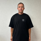 T-shirt Unwritten noir porté par Benoît, fondateur de JaOcCo, coupe oversize taille L, vue de face