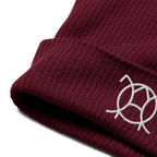 Embroidered JaOcCo logo on the cuff of the burgundy ribbed beanie