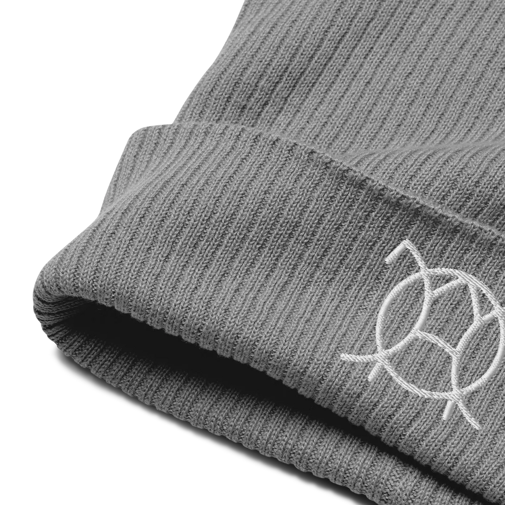 Embroidered JaOcCo logo on the cuff of the light grey ribbed beanie