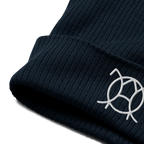 Embroidered JaOcCo logo on the cuff of the navy ribbed beanie