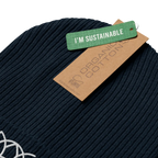 Navy ribbed beanie with its organic cotton tag